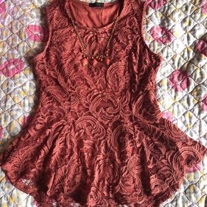 Burnt orange and pink lace blouse.